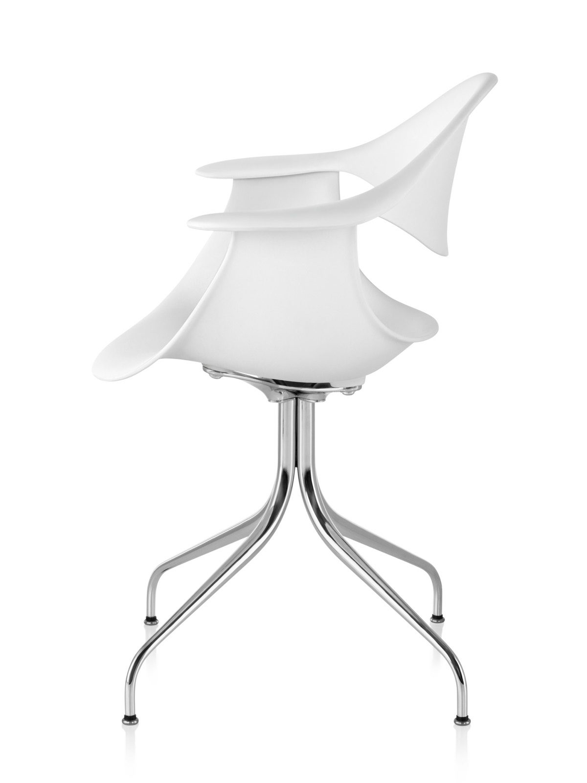 Profile view of a white Nelson Swag Leg Armchair, showing the molded plastic shell and curved steel legs.