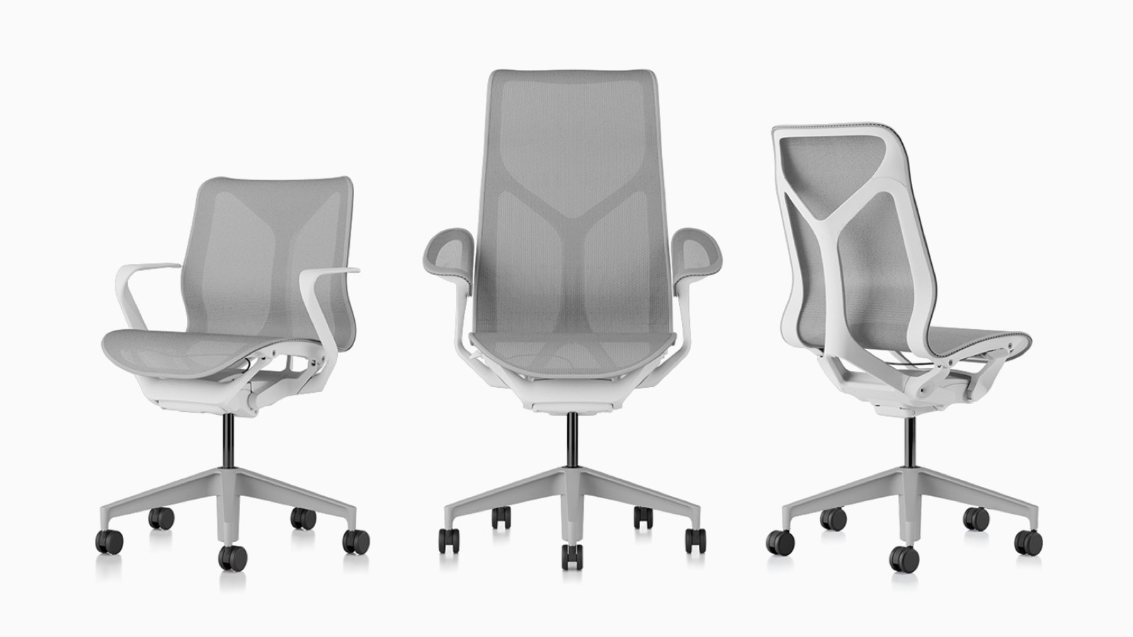Low-back, high-back, and mid-back Cosm ergonomic desk chairs with bases and frames in Studio White and suspension materials in Mineral light grey.