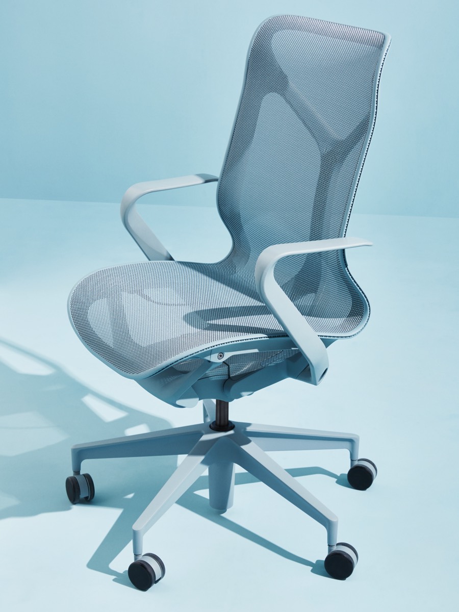 A Glacier light blue mid-back Cosm Chair on a light blue background.